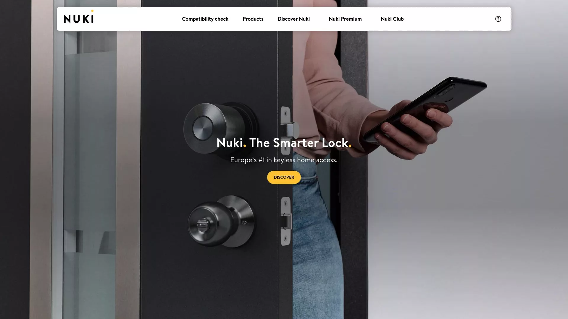 Screenshot of Nuki smart lock website showing the product features and app interface
