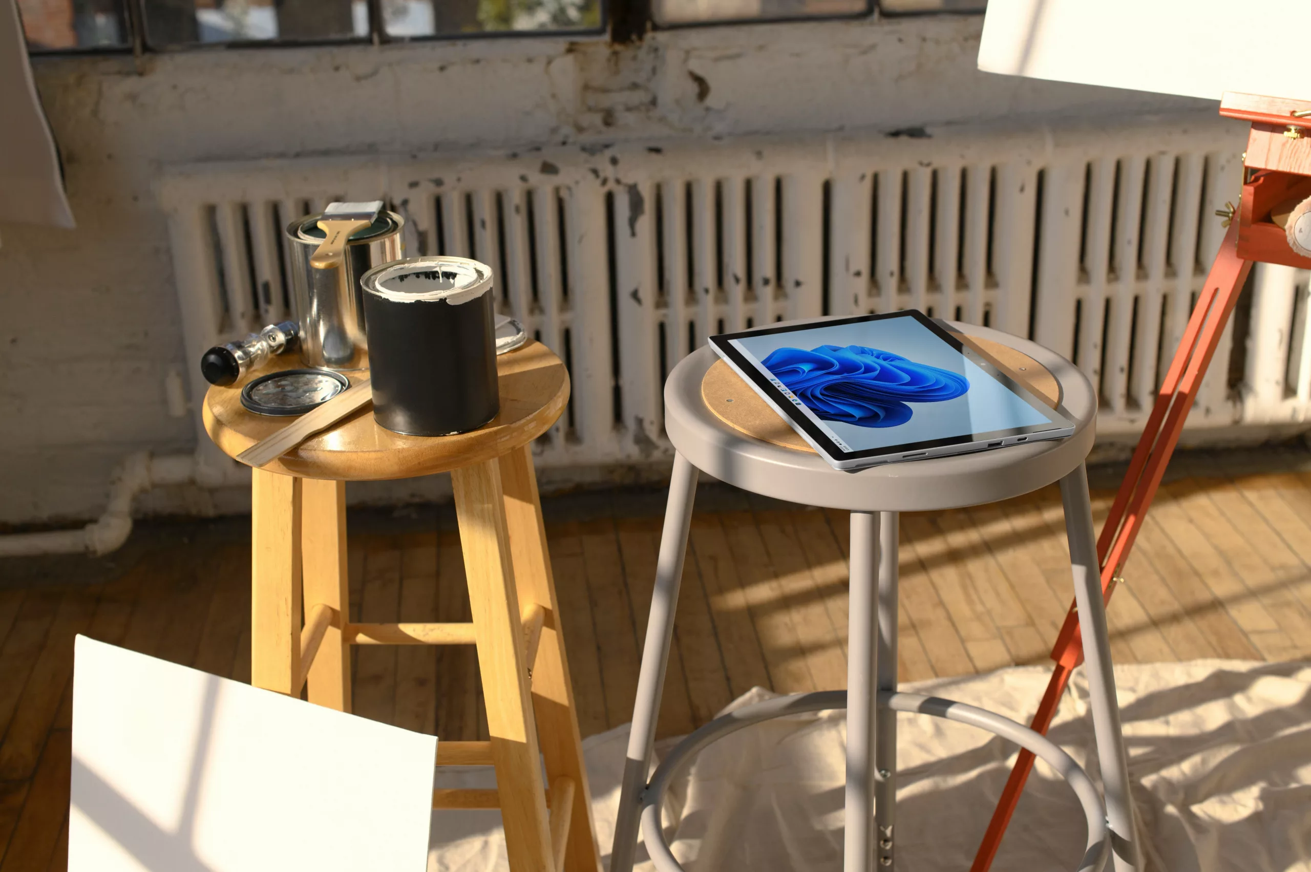 Property owner reviewing favorable financial reports on a tablet with a coffee on a wooden table