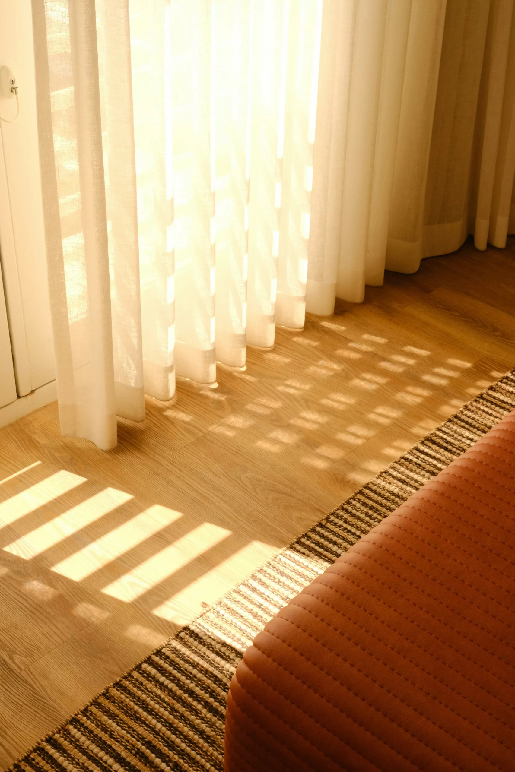 Reviewing interior design plans and fabric swatches for a rental property renovation