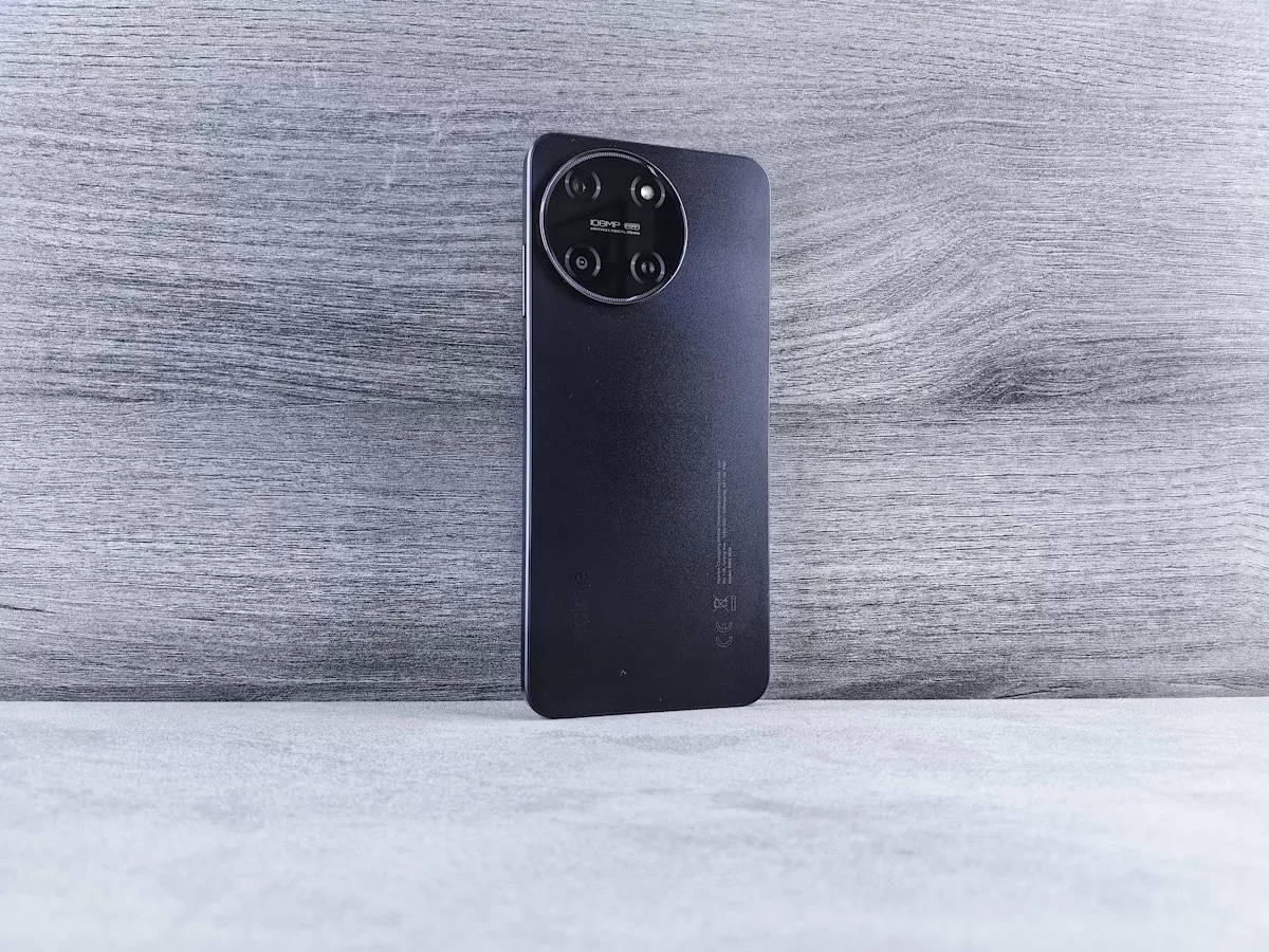 a close up of a cell phone on a table