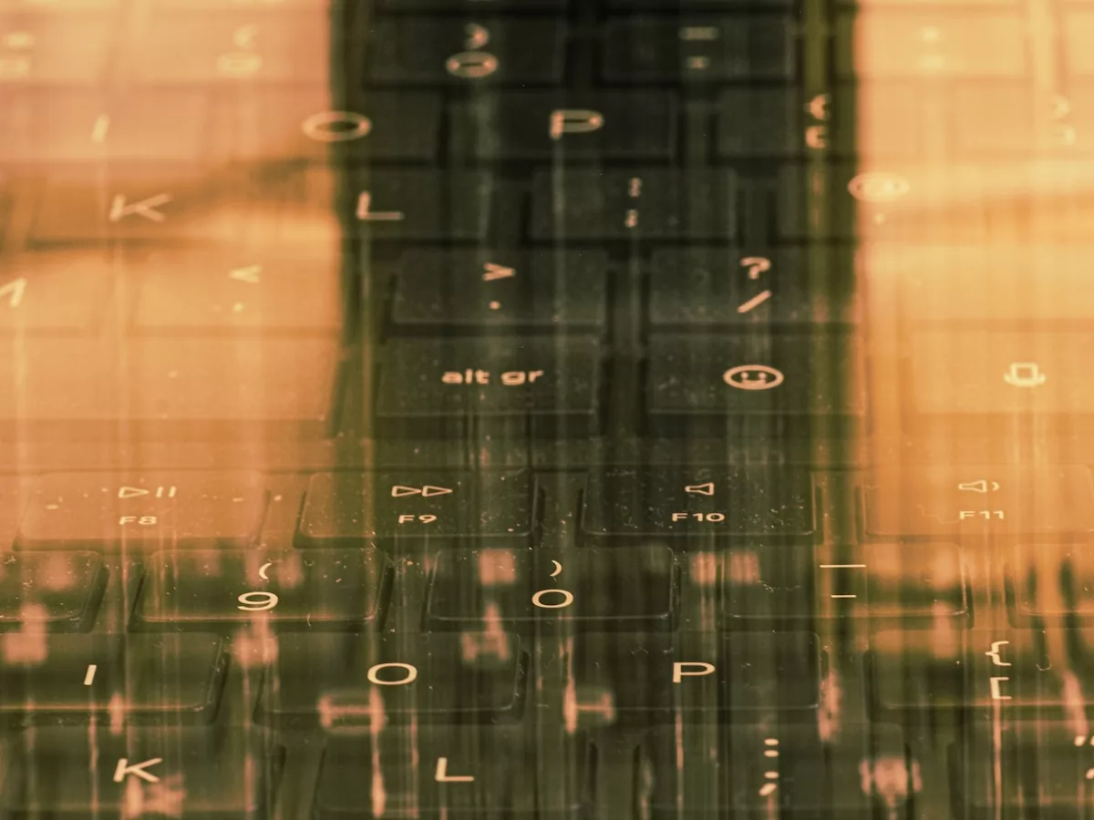 A close up of a window with a building in the background